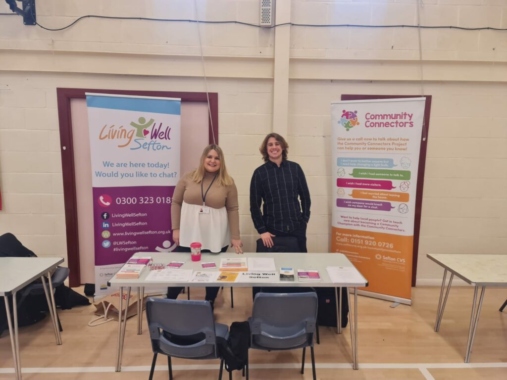 Community Connectors Louise and Joe at a local event with pop up banners and leaflets